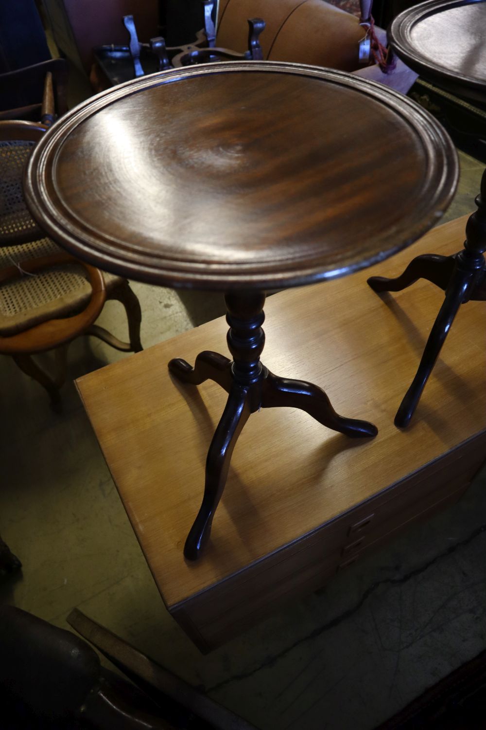 A 1920s chinoiserie lacquer tripod table, height 54cm and three others